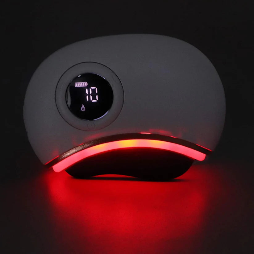 Heated stone massager for facial contouring