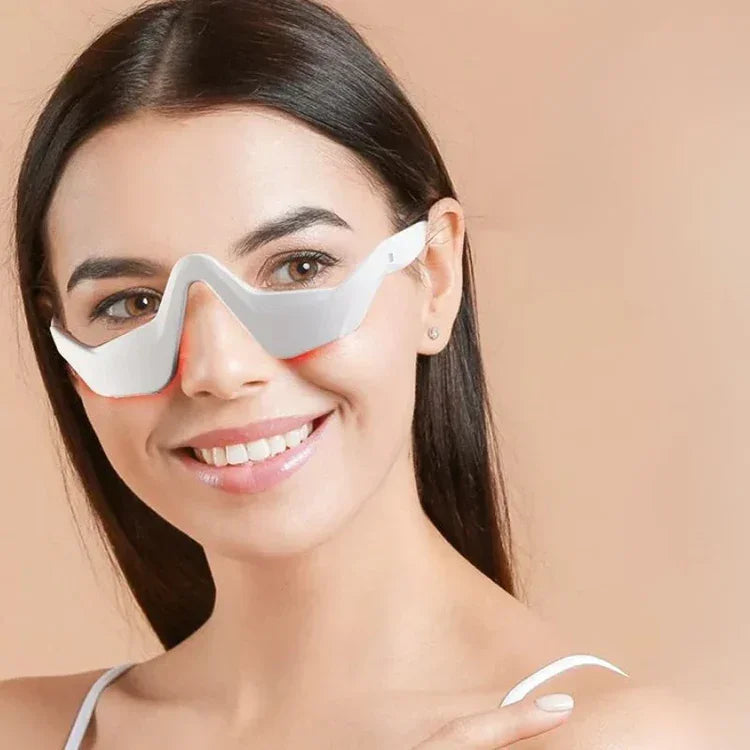 Portable eye massager device for reducing puffiness and fine lines.
