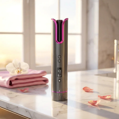 Electronic device on a marble surface with pink accents