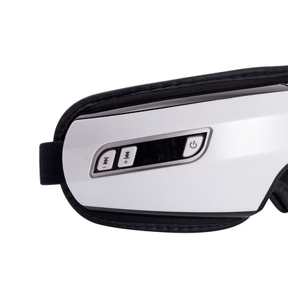 Close-up of a white electronic device with control panel on a white background