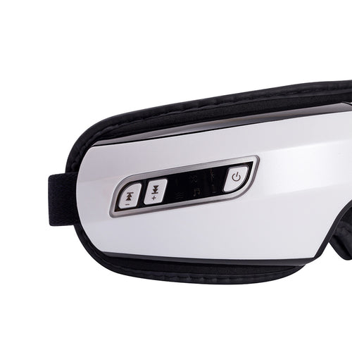 Close-up of a white electronic device with control panel on a white background