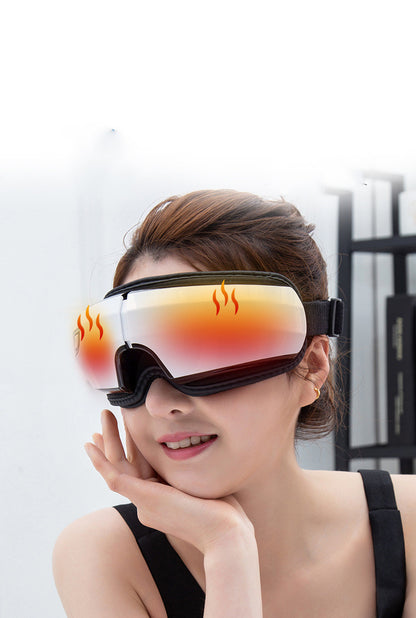 Woman wearing a pair of futuristic goggles with flame designs on a white background