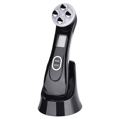 Black handheld electronic device with digital display on a white background